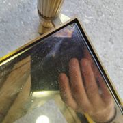 Vintage golden metal rolling dessert trolley