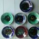 Seven plates of potter with multicolored enamels