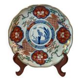 Imari porcelain plate from Japan, 19th century, hand-painted decoration.