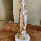 Virgin Mary crowned in metal and brass