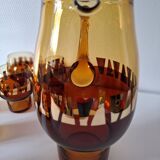 Carafe and its amber/gold glasses from the 70s