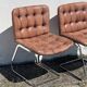 Paire de chaises en cuir par Robert Haussman