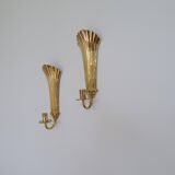 Pair of Art Deco brass wall sconces by Holmström, Arvika, Sweden, 1940s.