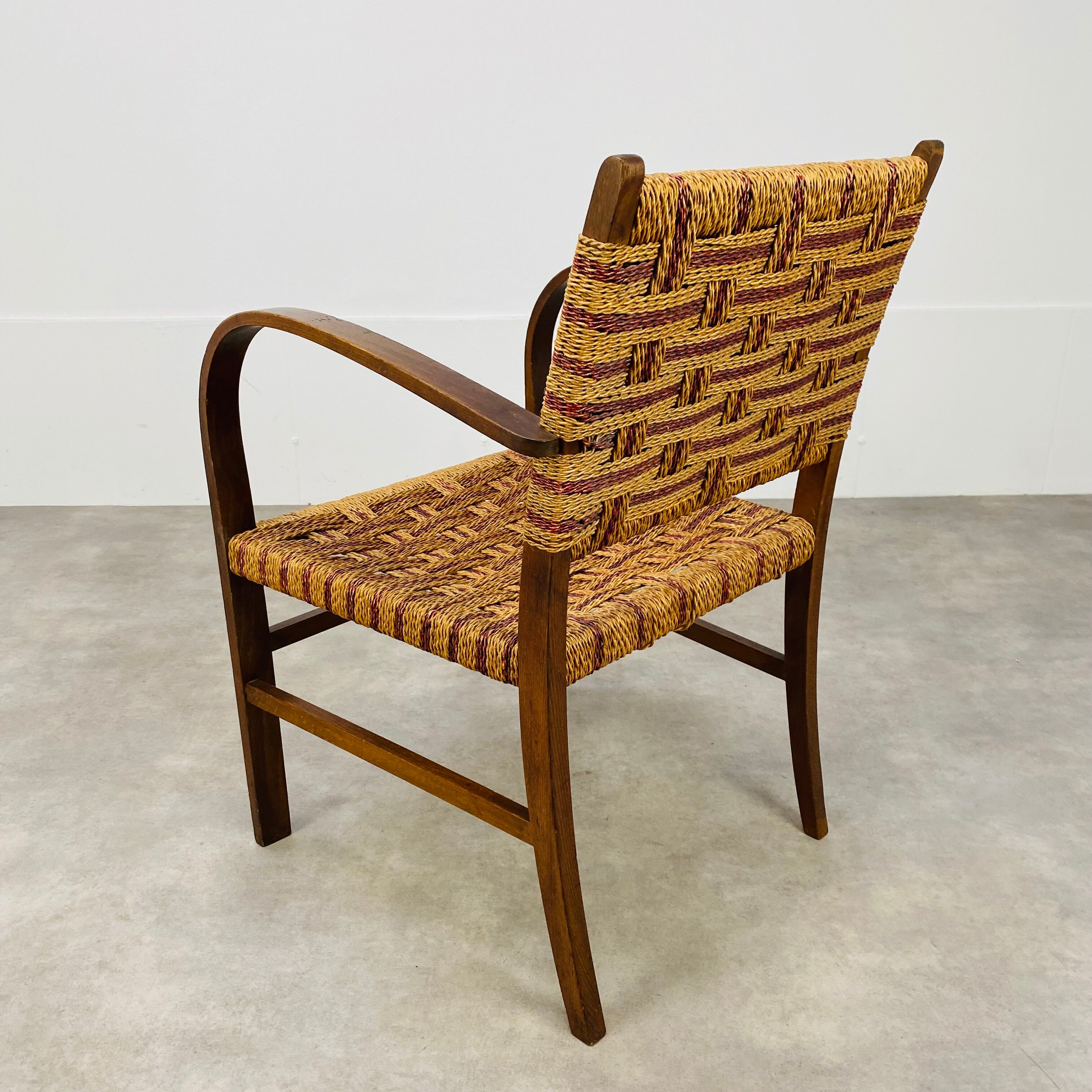 Scandinavian armchair in wood and vintage straw rope