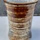 glazed ceramic vase with abstract flower decoration, signature to identify