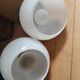 Duo of art deco wall lamps in porcelain and opaline