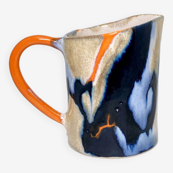 Blue and orange pitcher