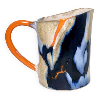 Blue and orange pitcher