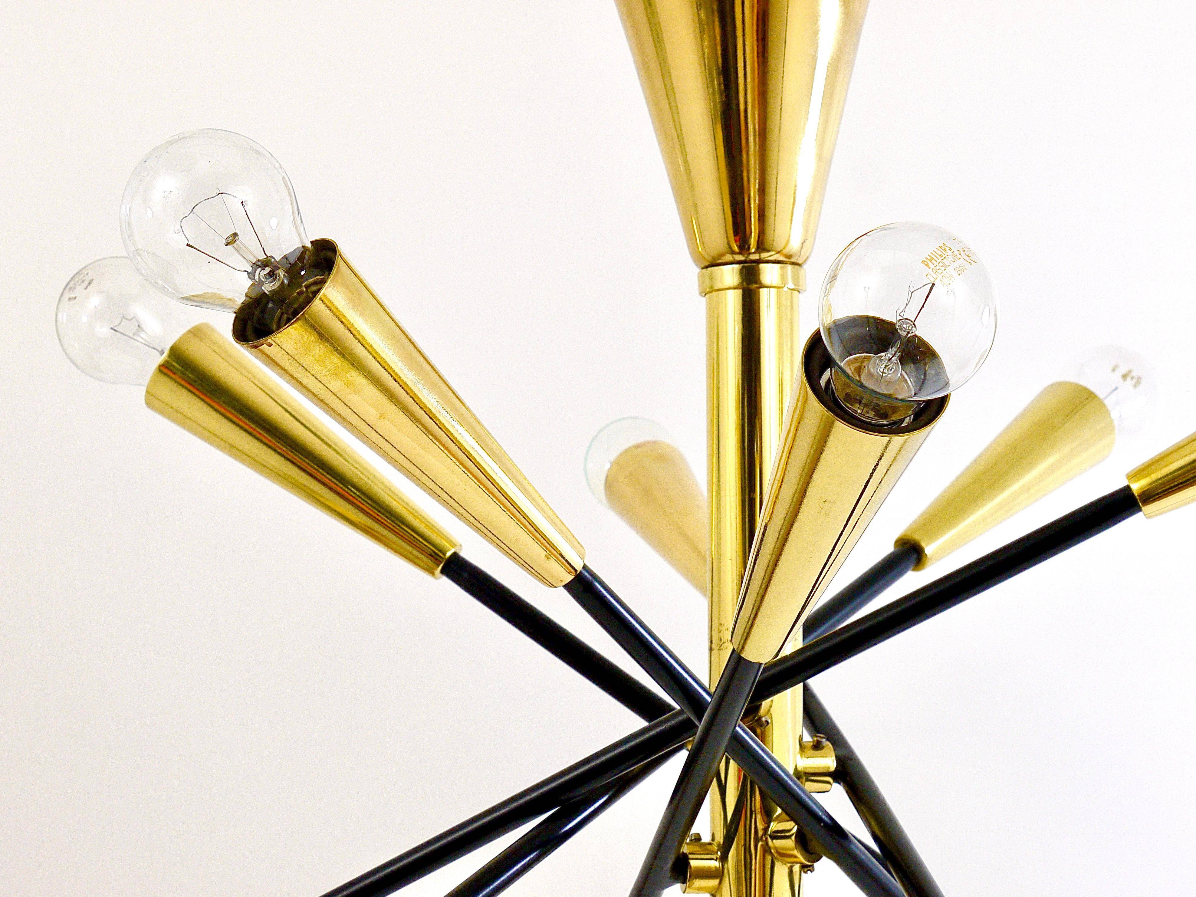 Black and brass articulated Sputnik chandelier in Stilnovo style, Italy, 1950.