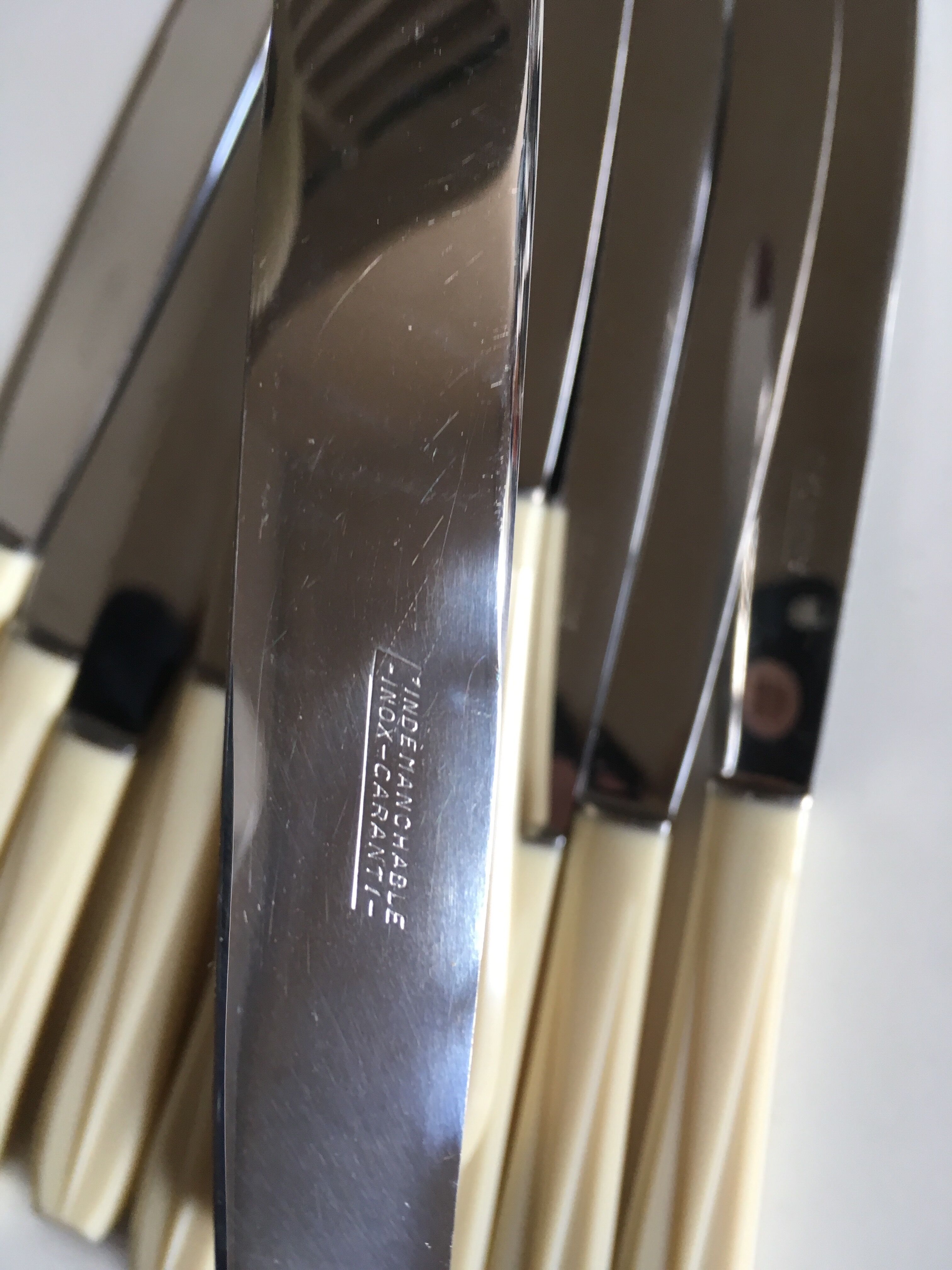 Set of 12 knives in white bakelite 50s