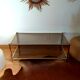 Table basse vintage dorée et verre fumé Rochebobois années 80