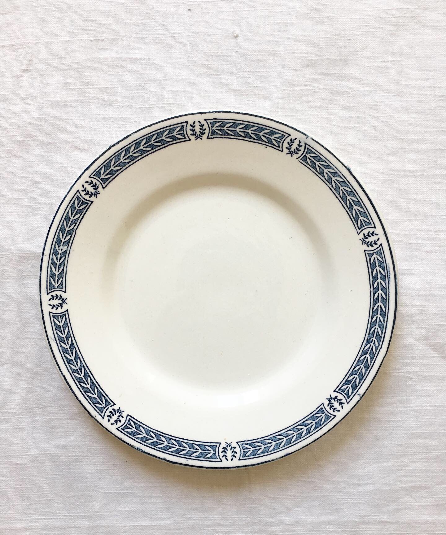 6 mismatched Iron Land dessert plates