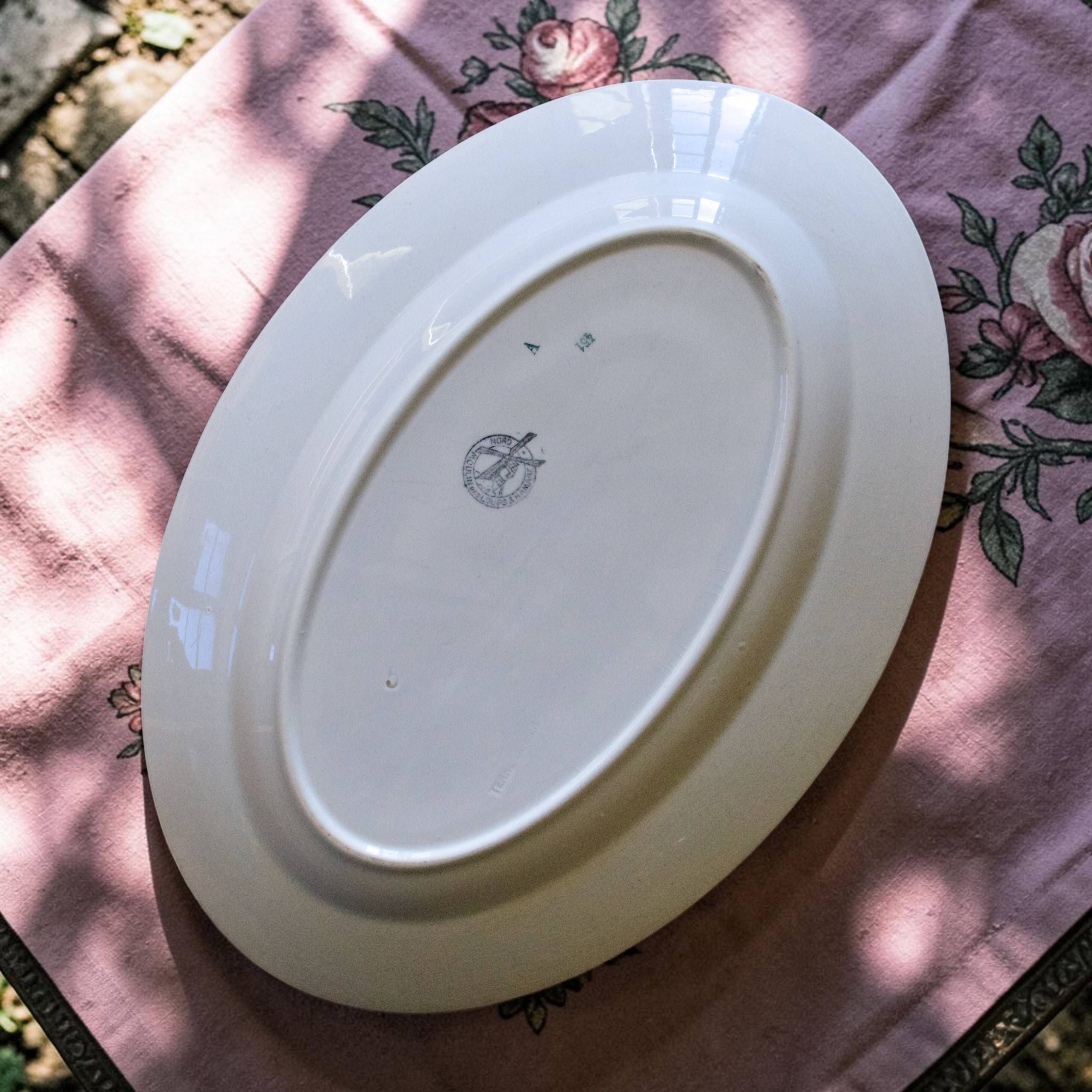 Large oval dish from the 19th century, ironstone, signed Moulin des Loups.