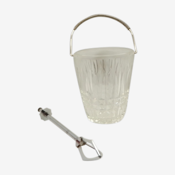 Vintage ice bucket in thick glass and a tong