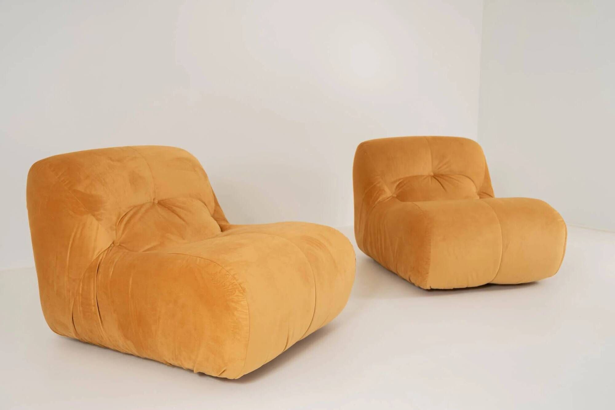 LOUNGE CHAIR NEWLY REUPHOLSTERED IN VELVETY FABRIC