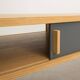 Coffee table with an oak cabinet equipped with 2 sliding doors, solid oak legs