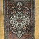 Antique handmade Hamadan Persian rug, ivory medallion on dark background 148x103.