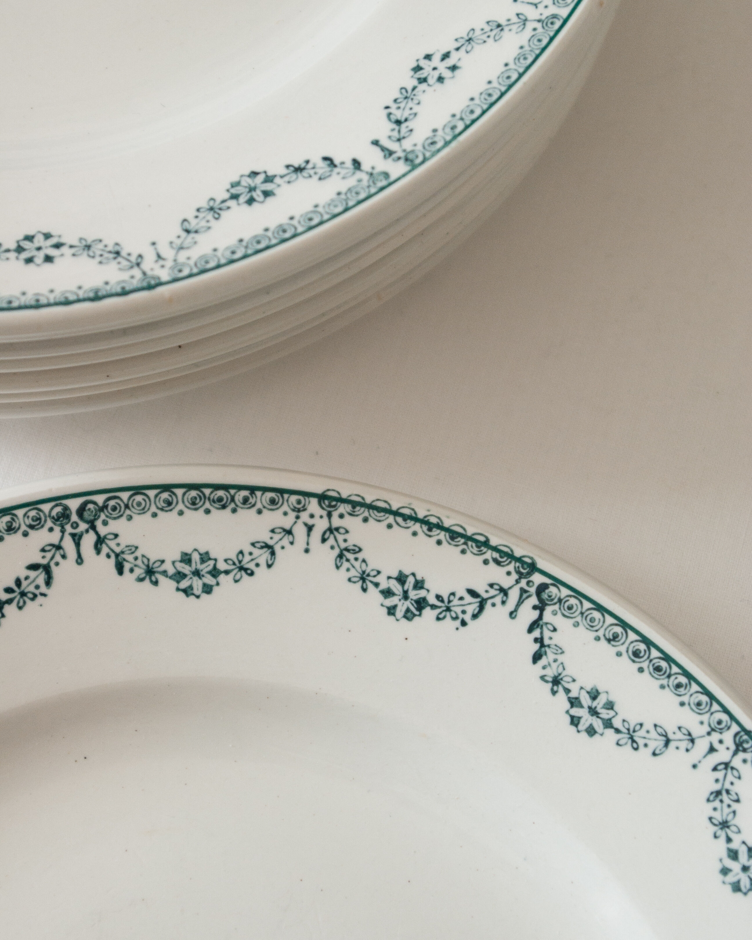 Old dessert plates, green flower decoration, iron earth