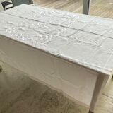 White hand-embroidered square tablecloth at stem stitch