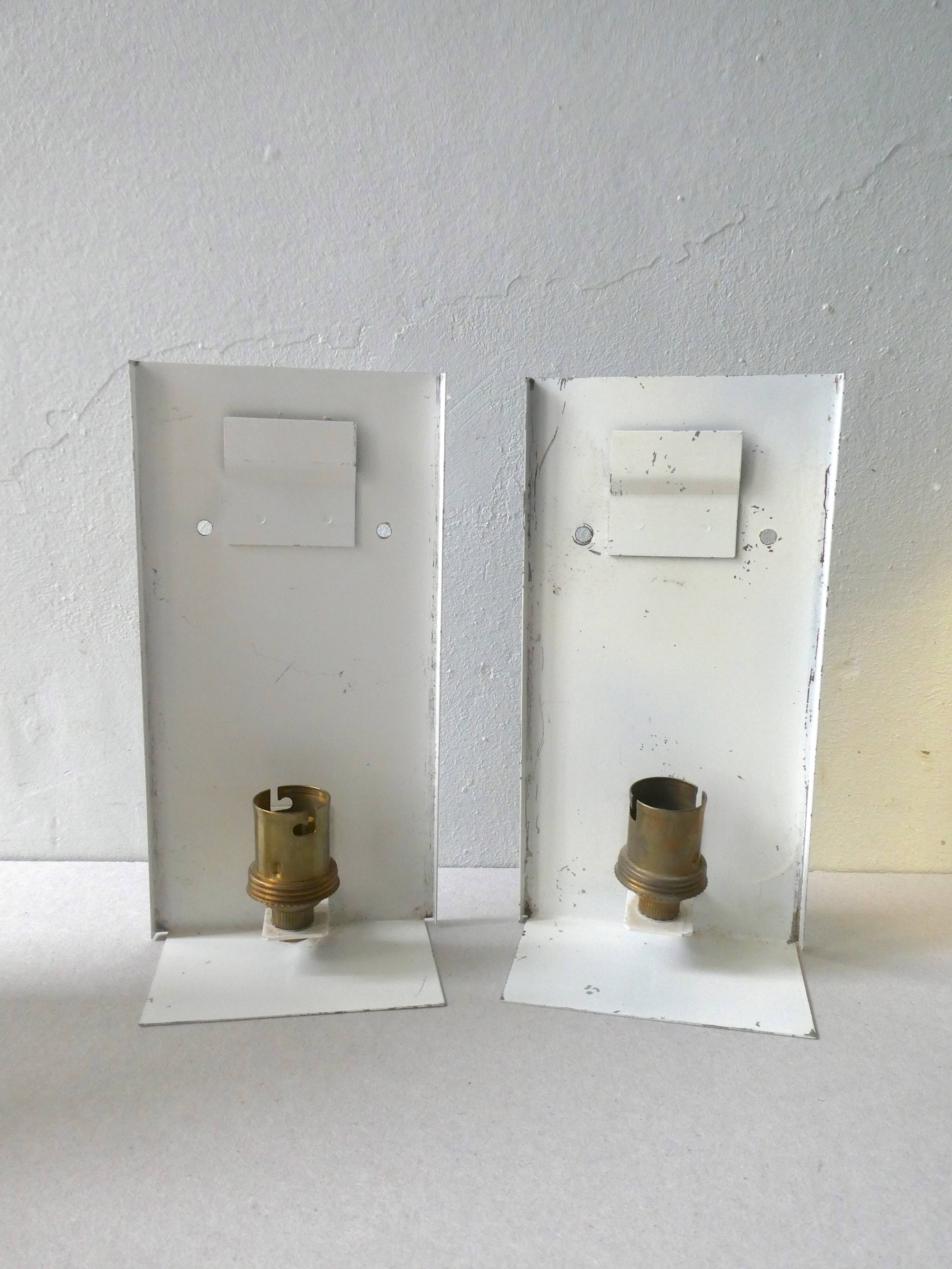 Pair of gold metal and frosted glass sconces