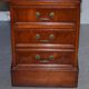 Partner desk with double pedestal in burr yew wood with decorated top.