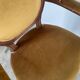 Paire de fauteuils médaillon en bois et velours
