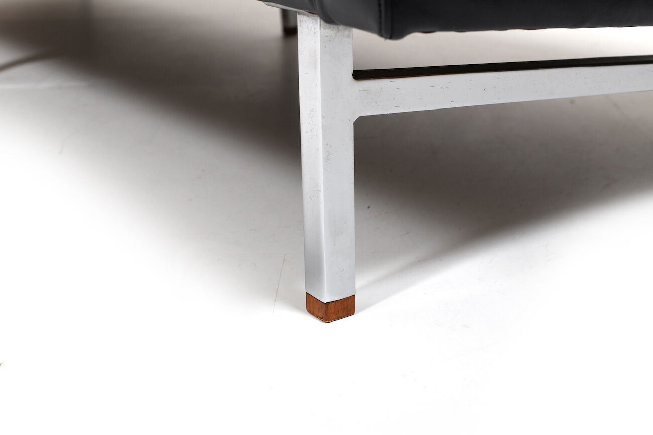 Danish leather sofa with chrome legs and teak ends