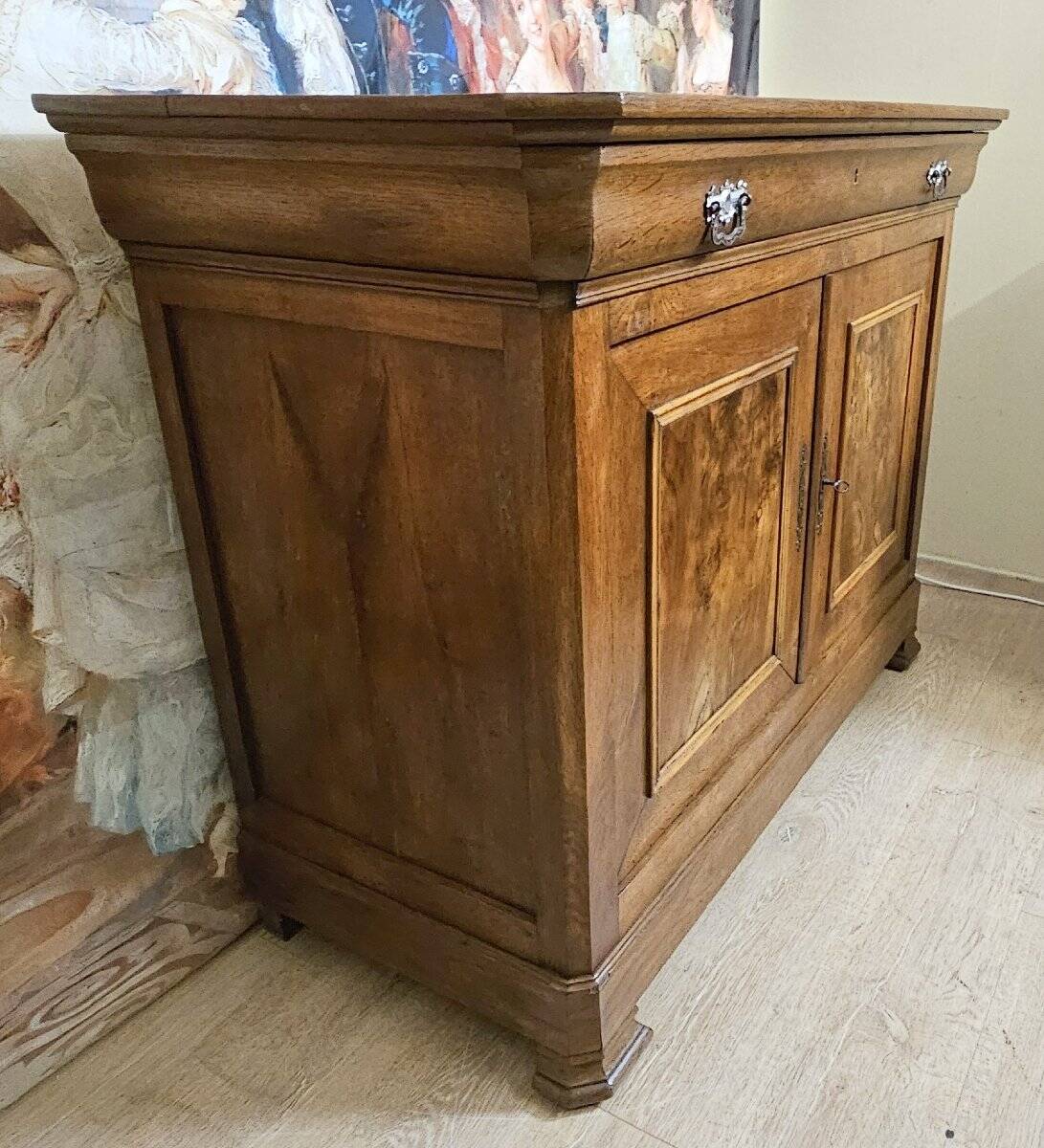 Low buffet with a curved front from the Louis Philippe period in walnut.