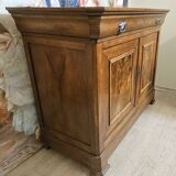 Low buffet with a curved front from the Louis Philippe period in walnut.