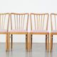 Set of four dining chairs from the 1970s with fabric seat and wooden frame