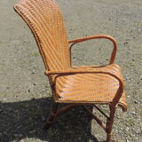 Rattan armchair with high backrest