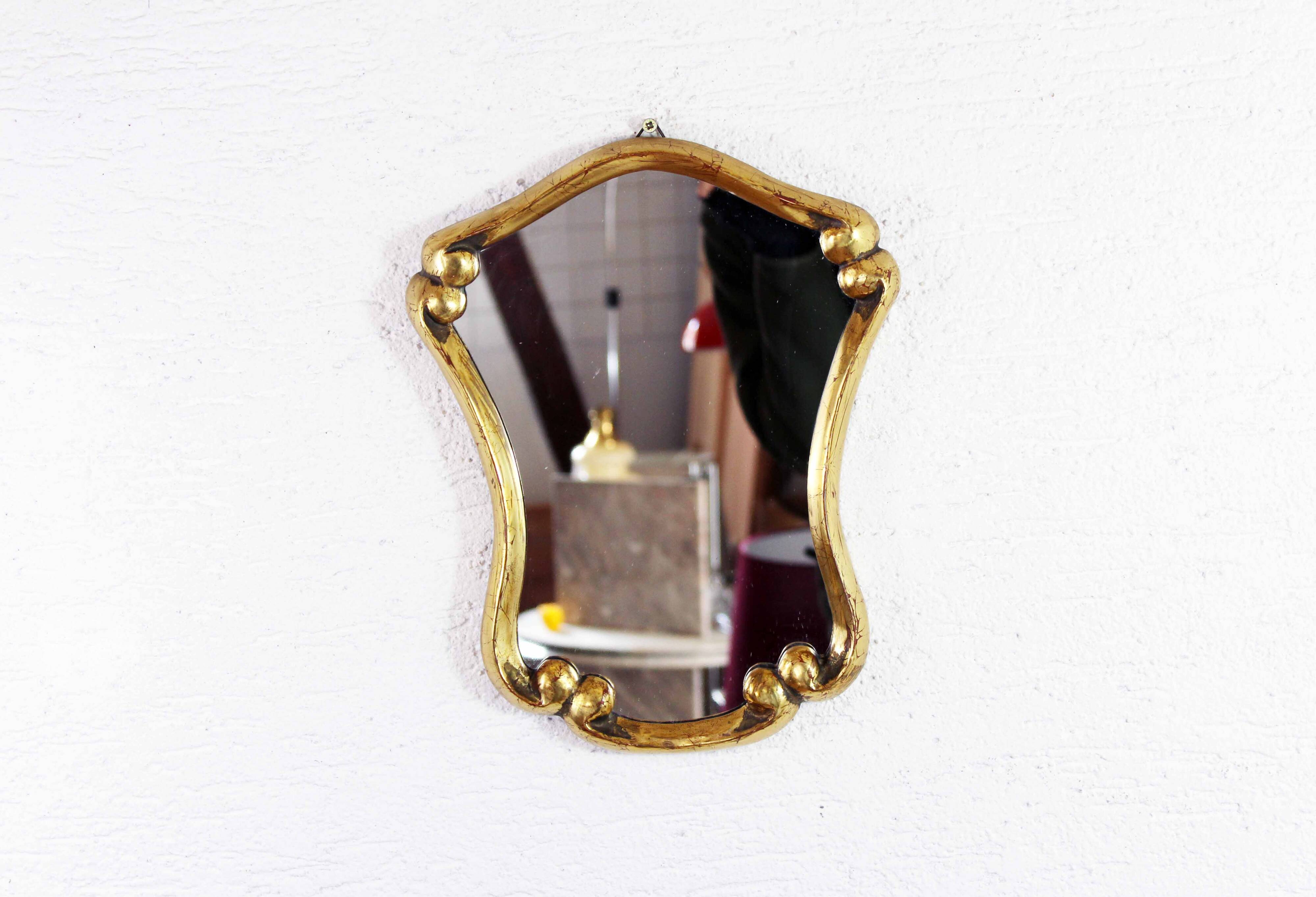 Mirror in gilded wood with leaf