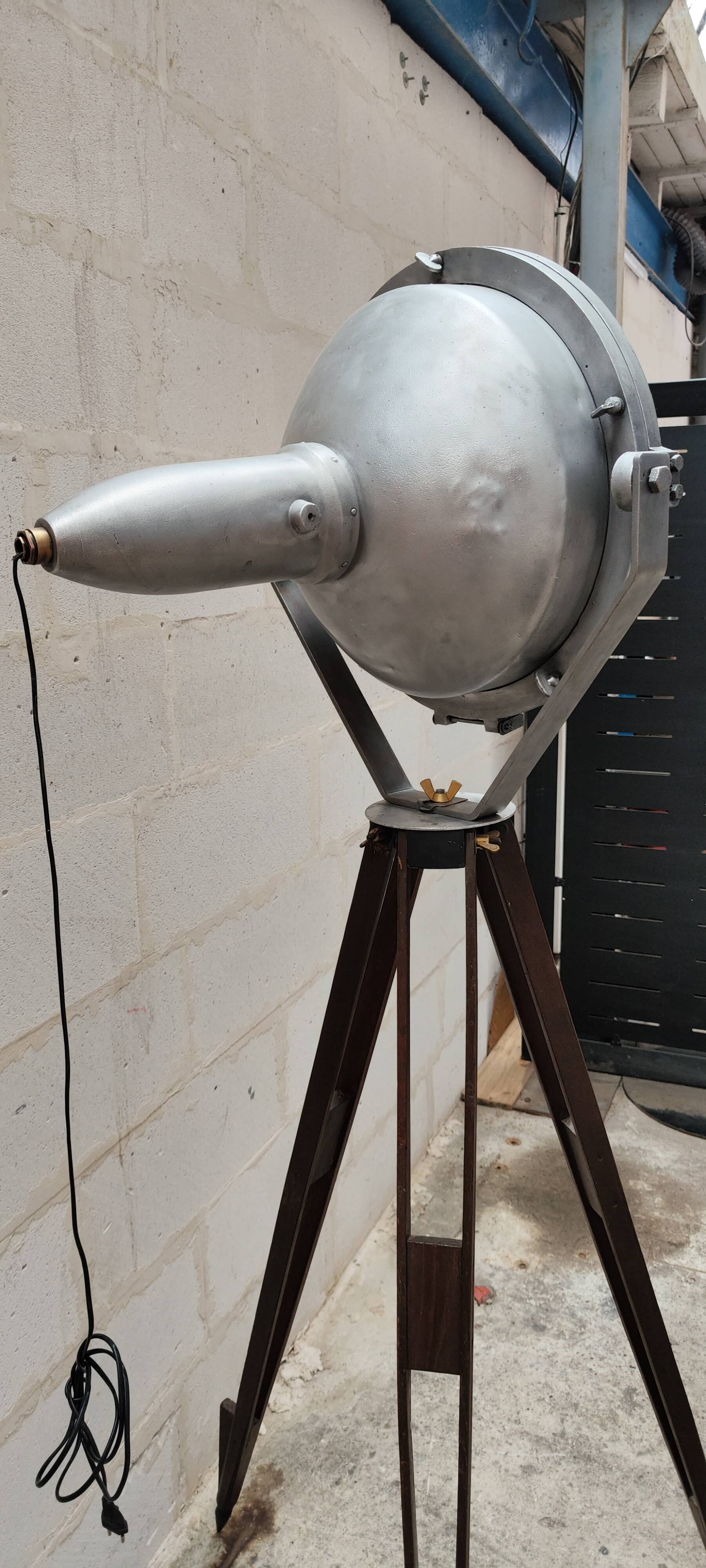 Old Mazda projector on wooden tripod