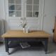 Coffee table on casters made from a vintage table, 1 drawer, 1 slate gray shelf.