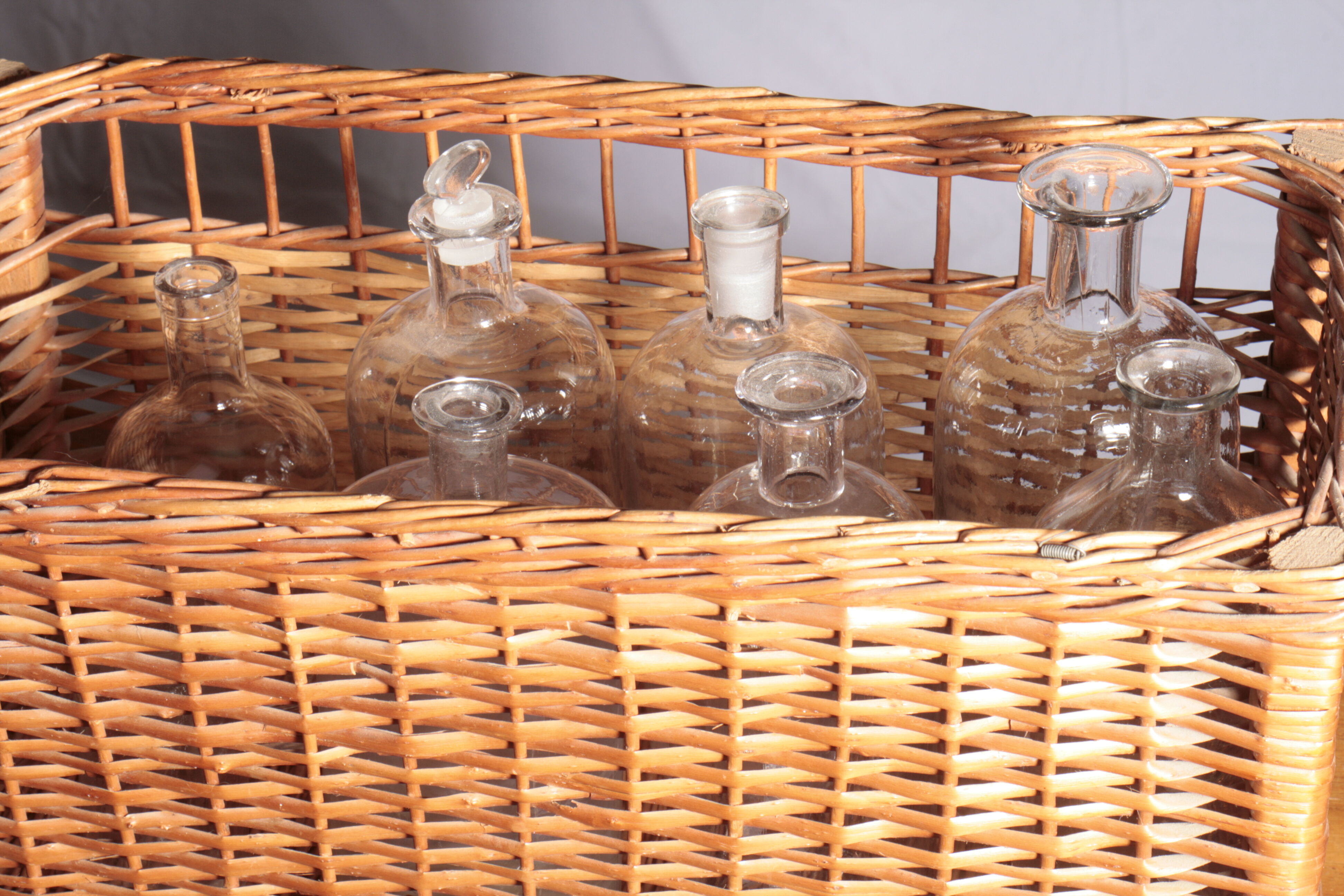 Set of pharmacy vials and wicker trunk