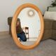 Vintage oval mirror in beech from the 70s/80s.