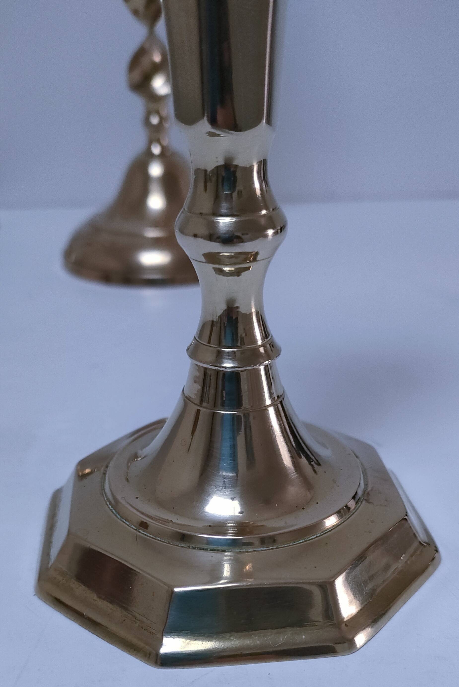 Three vintage solid brass candle holders