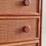 Vintage wicker chest of drawers.