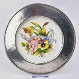 Decorative earthenware and pewter wall plate with spring flowers