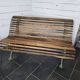 Old cast iron garden bench with oak slats