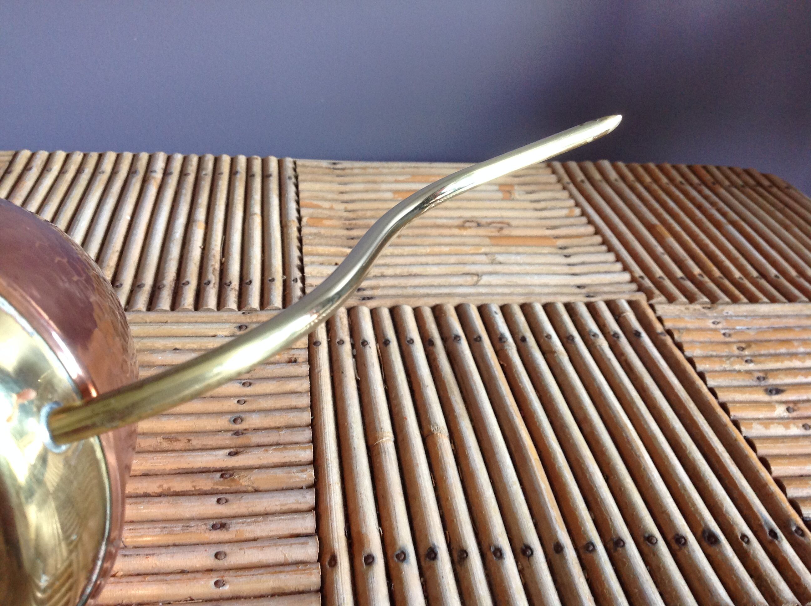 Copper and brass watering can