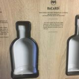 Store display for whisky and rum in metal and melamine