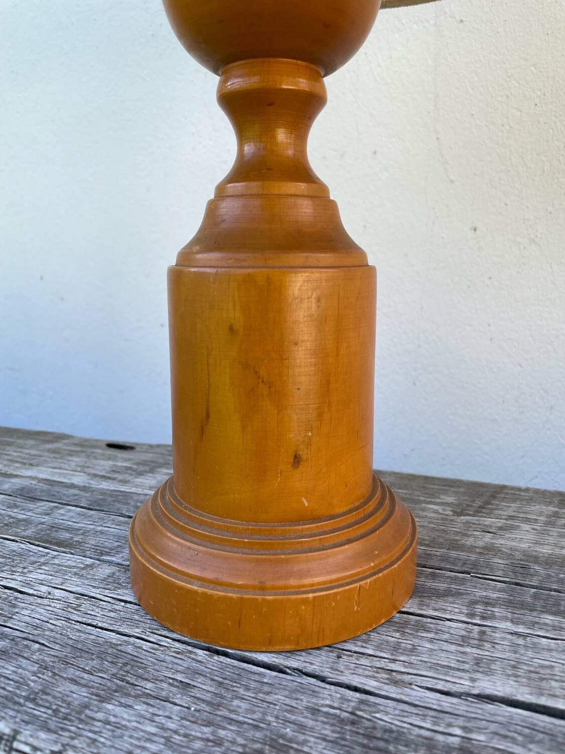 Old turned wooden lamp