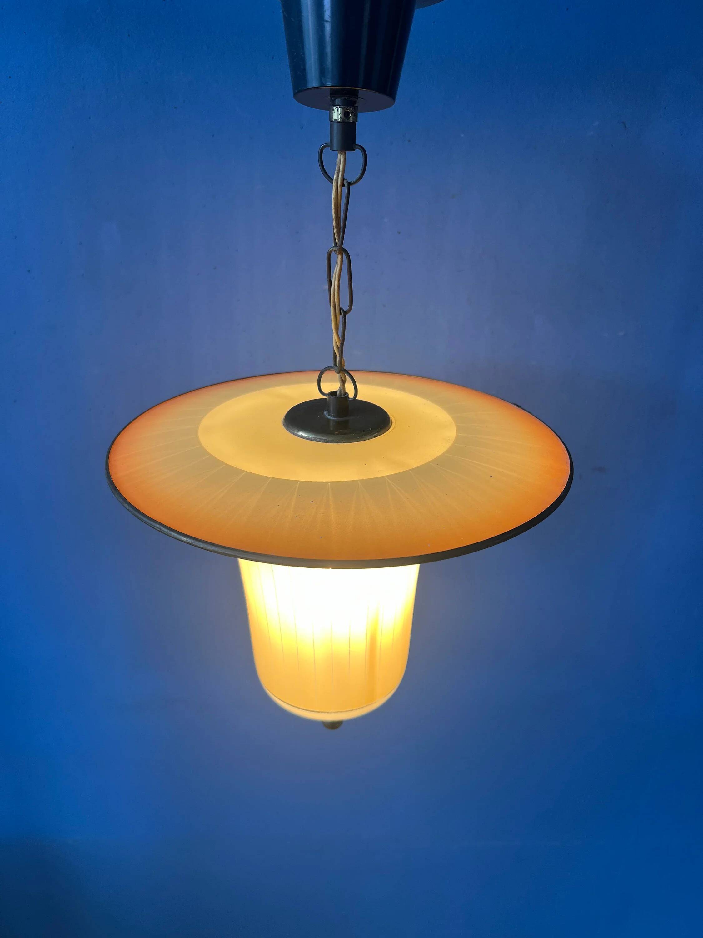 Vintage 1950s glass and brass pendant light.