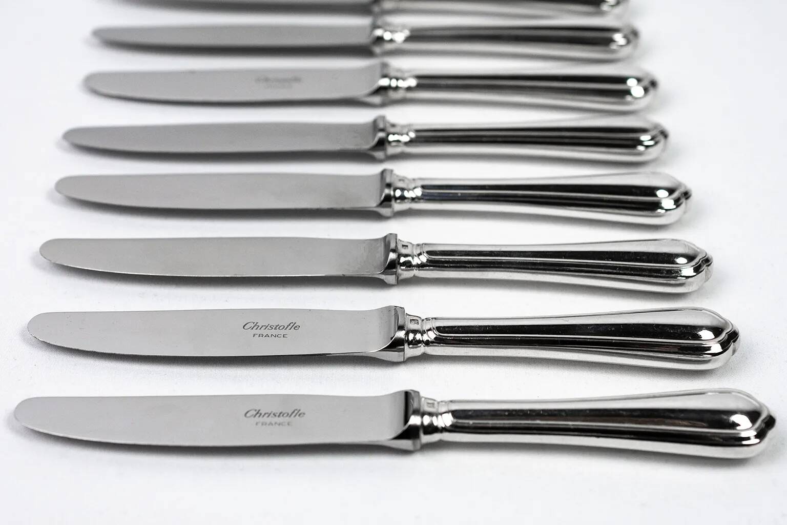 Christofle – 12 silver-plated dessert knives, Spatours model
