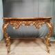 Console dorée style Louis XV