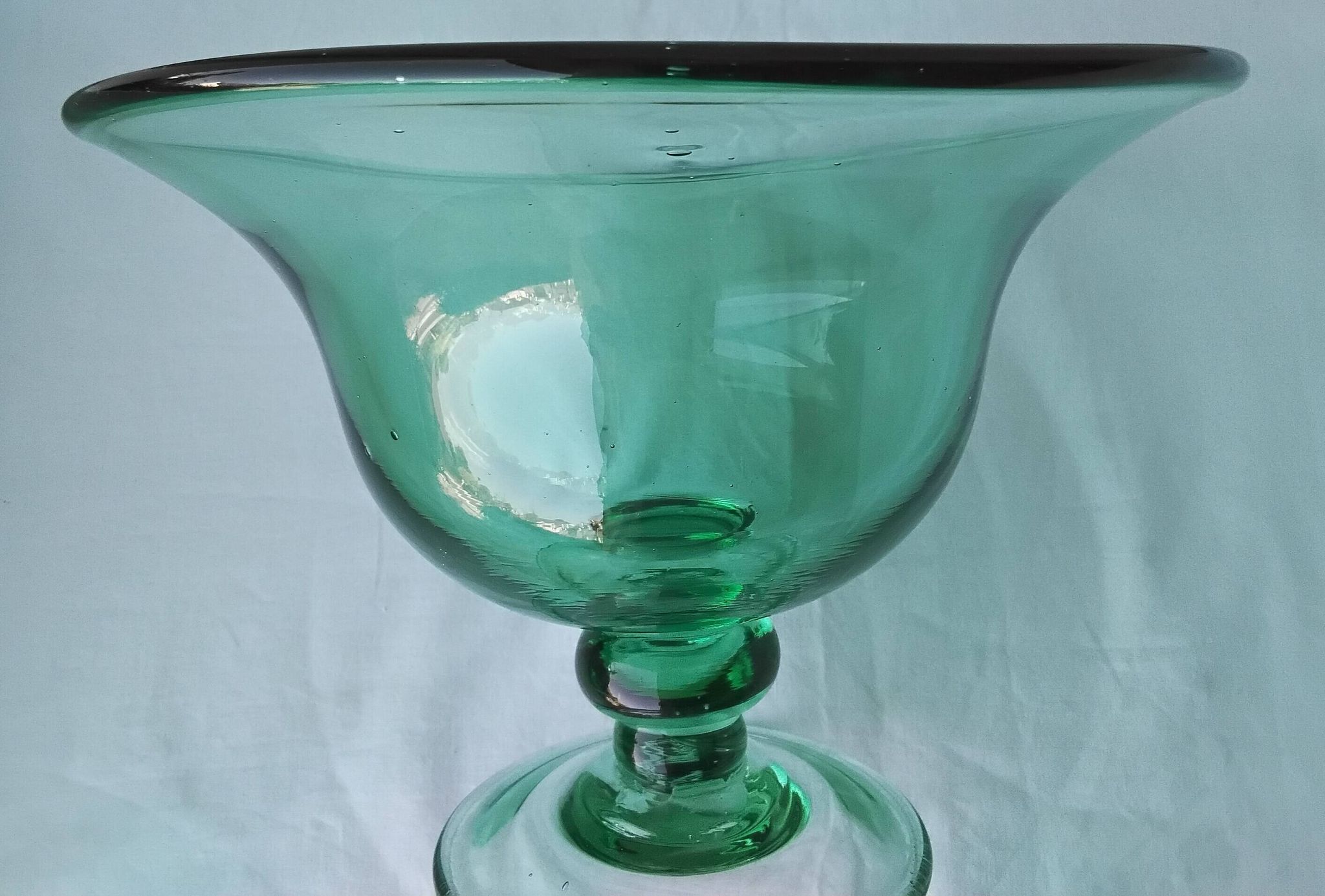 Glass coupe on a stand