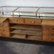 Counter or shop window in oak glass and brass France around 1920