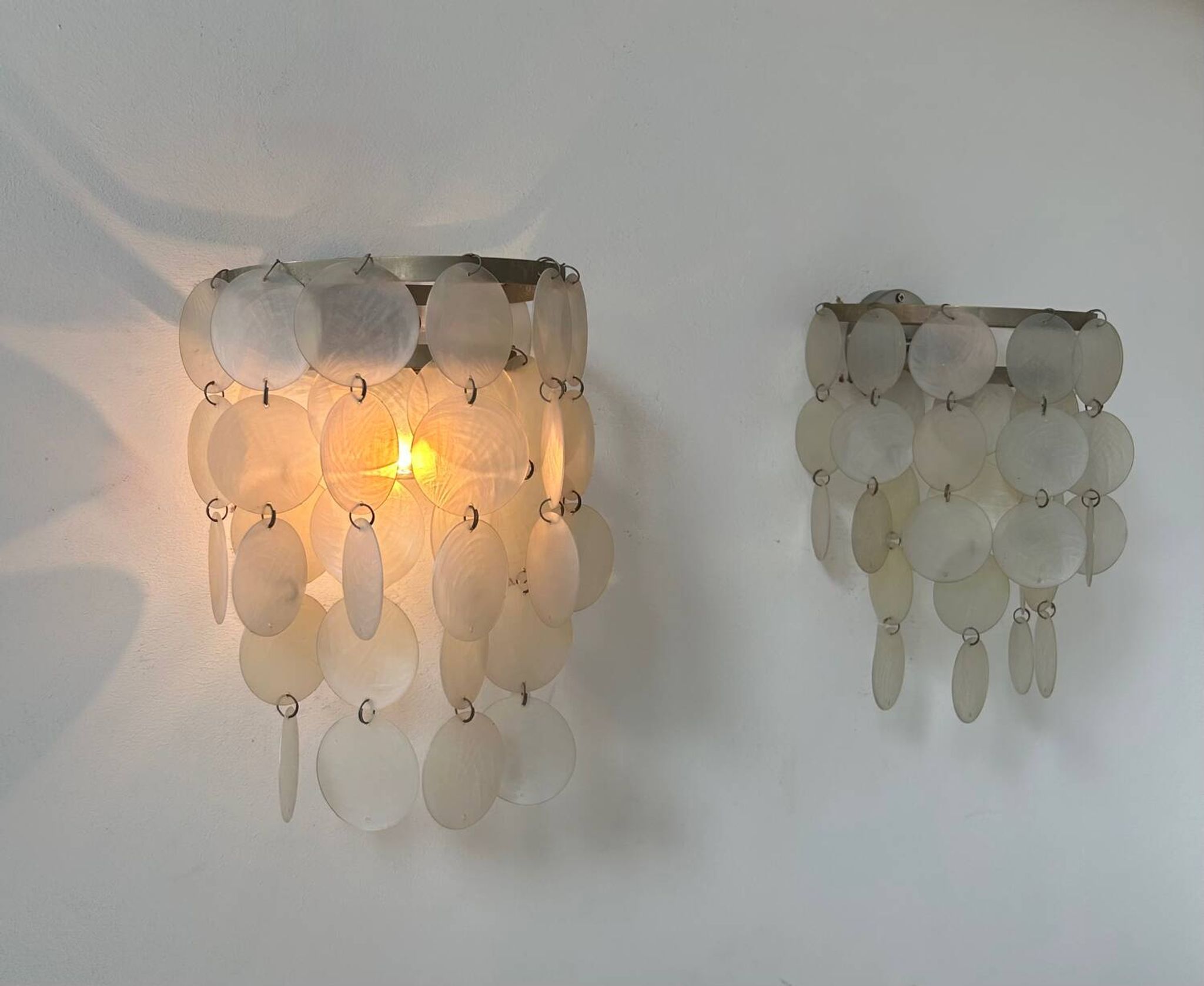 Pair of vintage mother-of-pearl and metal wall lights, France 1950s