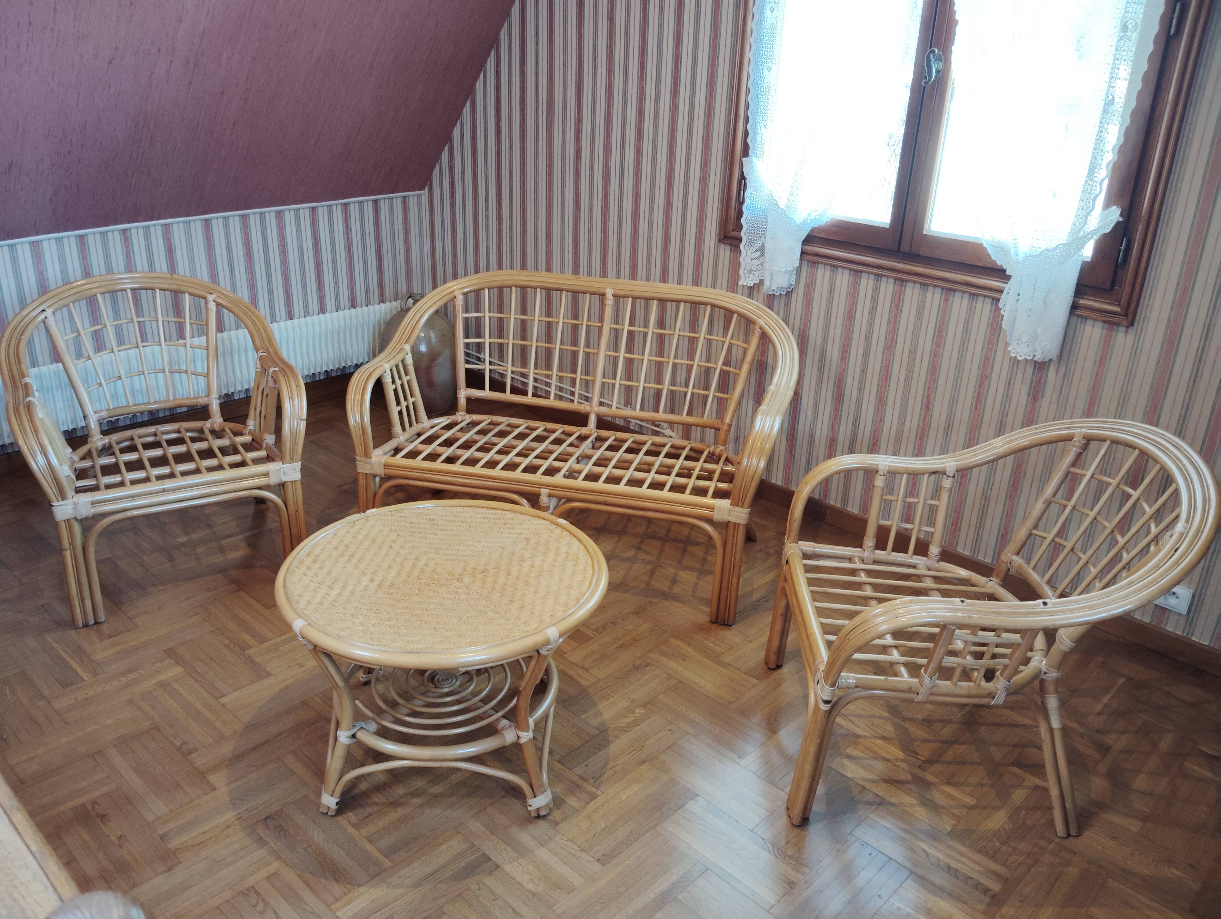 Rattan lounge with removable cushions